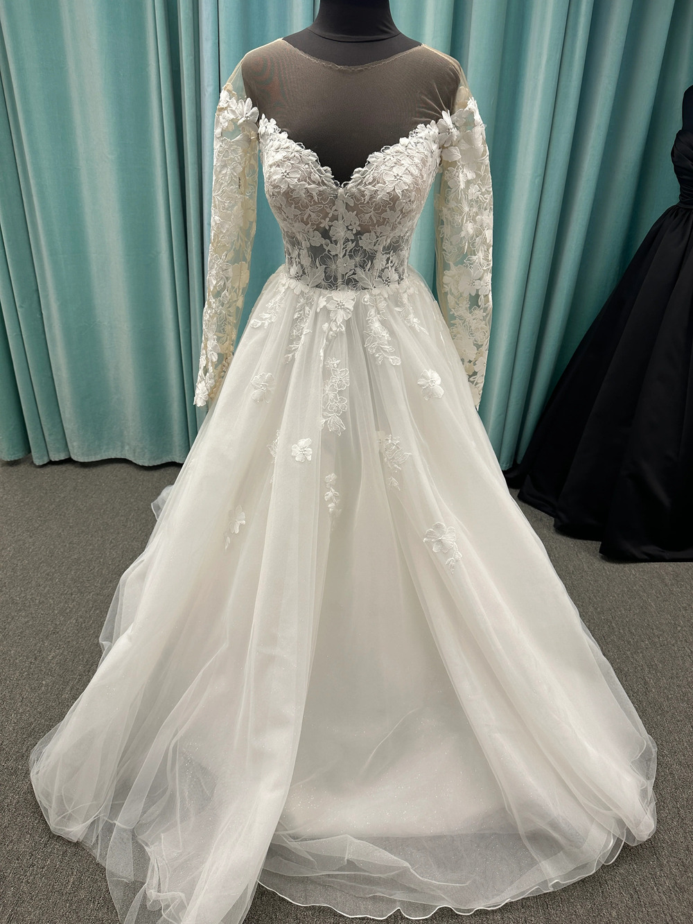 Stella York Style 8012 Illusion neck ballgown with long lace sleeves and tulle